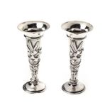 A PAIR OF EDWARDIAN SILVER SPILL VASES, WILLIAM COMYNS, LONDON, 1906 each trumpet-shaped body with