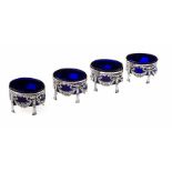 A SET OF FOUR CONTINENTAL SILVER TABLE SALTS, INDECIPHERABLE MARKS each oval-shaped body with