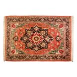 A TABRIZ SILK RUG, NORTH WEST PERSIA, MODERN the red field with a stylised dark indigo-blue and