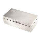 A GEORGE V SILVER CIGAR BOX, INDECIPHERABLE MAKER'S MARK, LONDON, 1932 the rectangular body with