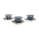 TWO CHINESE BLUE AND WHITE TEA BOWLS AND SAUCERS each with a central rondel depicting a lake scene