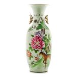 A LARGE CHINESE FAMILLE ROSE VASE, REPUBLIC PERIOD, 1911–1948 the tapering ovoid body painted with a