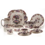 A ROYAL CAULDON PART TEA SERVICE, 20th CENTURY each with burgundy and blue flowers on a crème