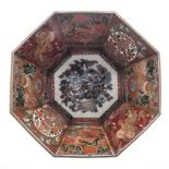 A JAPANESE IMARI HEXAGONAL BOWL, MEIJI, 1868-1912 the interior painted with a central shi-shi