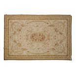 A EUROPEAN STYLE TAPESTRY, MODERN the ivory field with a multi-coloured floral medallion all with