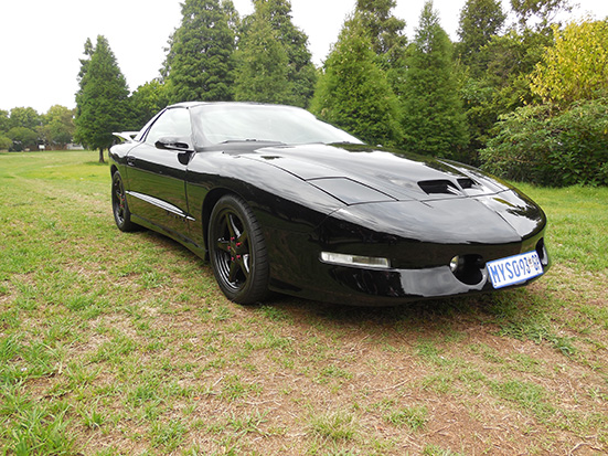 A 1996 PONTIAC TRANSAM Colour: pearl black with special leather interior with Alcantara suede and