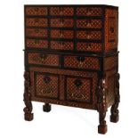 AN INDO-PORTUGUESE EBONY AND WALNUT INLAID CABINET-ON-STAND in two parts, the rectangular top