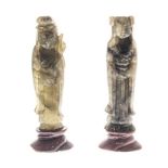 TWO CHINESE CARVED JADEITE FIGURES OF STANDING MAIDENS each dressed in long robes, one holding a