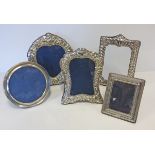 A MISCELLANEOUS COLLECTION OF FIVE SILVER PICTURE FRAMES, VARIOUS MAKERS AND DATES, BIRMINGHAM,
