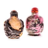 A CHINESE 'LAC BURGAUTE' SNUFF BOTTLE AND STOPPER the tapering ovoid body decorated in mother-of-