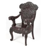 A JAPANESE EXPORT LACQURED DRAGON ARMCHAIR, 20TH CENTURY the shaped back elaborately carved,