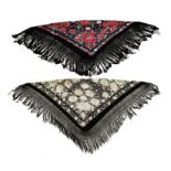 TWO SPANISH DANCING SHAWLS each embroidered with a rose pattern bordered by a crocheted fringe the