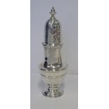 A GEORGE V SILVER SUGAR CASTER, C S HARRIS & SONS LTD, LONDON, 1912 the baluster body with reeded