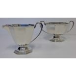 A SILVER MILK JUG AND TWO-HANDLED SUGAR BASIN, BIRMINGHAM, 1936 AND 1937 each octagonal body applied