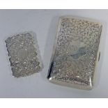 A VICTORIAN SILVER CARD CASE, MAKER’S MARK JNM, BIRMINGHAM, 1893 scrolling foliage centred with a