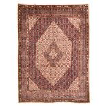 A MOUD CARPET, EAST PERSIA, MODERN the ivory field with a pale blue-and-ivory diamond medallion,