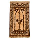 AN AFGHAN RUG, MODERN the ivory field with a twin column arch design depicted in brown and black,