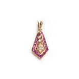 A RUBY AND DIAMOND PENDANT the kite-shaped surround channel set with carré-cut rubies and