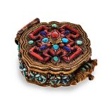 A BUDDHIST GILT-METAL PRAYER AMULET the hinged cover applied with coral, turquoise and lapis