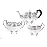 A VICTORIAN SILVER THREE-PIECE TEA SET, JOSEPH RODGERS & SONS, SHEFFIELD, 1899 comprising: a teapot,