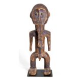 A LENGULE FIGURE, DEMOCRATIC REPUBLIC OF CONGO the bearded male figure carved with elaborate