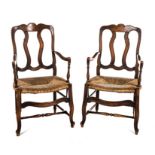 A PAIR OF FRUITWOOD RUSH SEAT ARMCHAIRS each shaped top and bottom rail joined by a pair of shaped