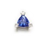 A TANZANITE AND DIAMOND PENDANT centred with a trillion-cut tanzanite weighing approximately 4.