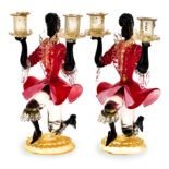 A PAIR OF VENETIAN GLASS 'BLACKAMOOR' CANDLESTICKS modelled as a Blackamoor kneeling in elaborate