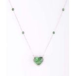 A TSAVORITE AND DIAMOND PENDANT NECKLACE claw set to the centre with a heart-shaped chequer-cut