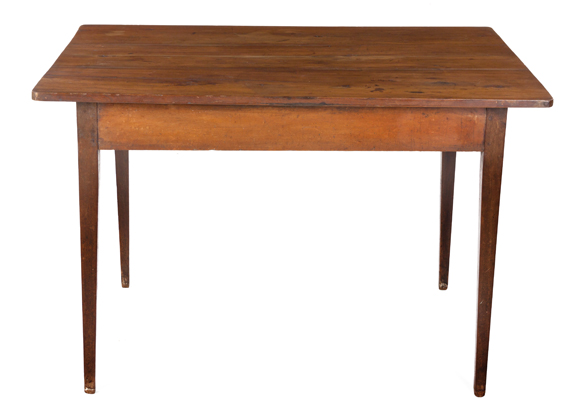 A YELLOWWOOD AND STINKWOOD TABLE, 19TH CENTURY the rectangular top above a plain frieze, on square-