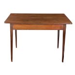 A YELLOWWOOD AND STINKWOOD TABLE, 19TH CENTURY the rectangular top above a plain frieze, on square-
