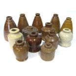 A MISCELLANEOUS GROUP OF STONEWARE INK POTS of various forms, in sizes, including: tapering