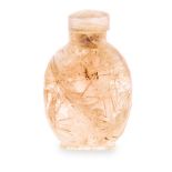 A CHINESE 'HAIR' CRYSTAL SNUFF BOTTLE AND STOPPER the rounded rectangular clear crystal body with