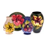 A MISCELLANEOUS GROUP OF FOUR WALTER MOORCROFT WARES, 1940s and 1950s comprising: a small tapering