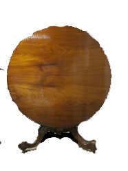 A VICTORIAN MAHOGANY TILT-TOP CENTRE TABLE the circular top above a plain frieze, on a baluster