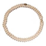 A PEARL NECKLACE opera length, composed of a single strand of one hundred and nineteen pearls