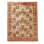 A FINE QUM SILK RUG, PERSIA, MODERN the field divided into seventy-seven squares, each containing