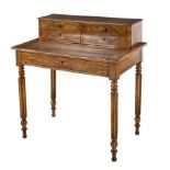 A WILLIAM IV WALNUT ESCRITOIRE the moulded rectangular top with a sliding gilt-tooled leather-
