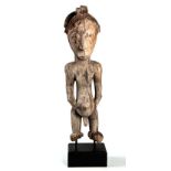 A HEMBA ANCESTRAL FIGURE, DEMOCRATIC REPUBLIC OF CONGO, 20TH CENTURY the standing figure with