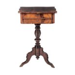 A FLAME MAHOGANY WORK TABLE, LATE 19TH/EARLY 20TH CENTURY the shaped rectangular top above a pair of