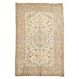 A KESHAN CARPET, PERSIA, MODERN the ivory field with pale blue floral skeleton medallion and