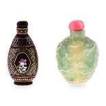 A CHINESE CARVED AGATE SNUFF BOTTLE AND STOPPER the flattened ovoid body of brown, russet and