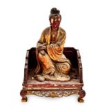 A CHINESE POLYCHROME AND PARCEL-GILT FIGURE OF GUANYIN seated in rajalilasana on an associated