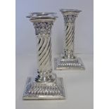 A PAIR OF VICTORIAN SILVER CORINTHIAN CANDLESTICKS, MARTIN, HALL & CO, LONDON, 1892 AND 1893 each