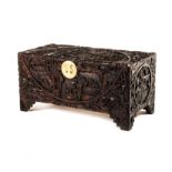 A CHINESE CAMPHORWOOD EXPORT CHEST, 20TH CENTURY the hinged rectangular top carved with figures at