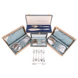 A SET OF TWELVE LARGE GERMAN SILVER CASED DESSERT SPOONS, .800 threaded front with beaded engraved