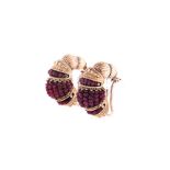 A PAIR OF RUBY EARRINGS each of semi-hoop design, comprised of sections of alternating rope and bead