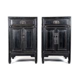 A PAIR OF CHINESE STYLE EBONISED BEDSIDE CABINETS, 20TH CENTURY each square top above a panelled