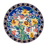 A LONGWY ENAMELLED ‘PRELUDE’ PATTERN CHARGER, 1950’s painted with daffodils and stylised flowers
