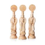 THREE CHINESE POTTERY FIGURES OF DIGNITARIES, SONG, 960-1279 each standing on a circular stepped